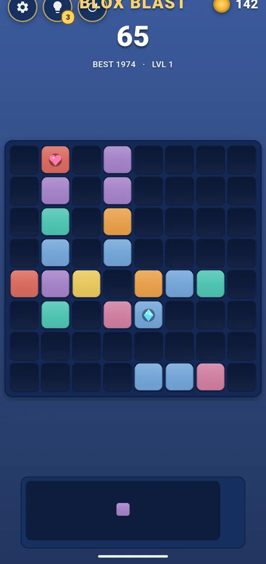 Mid-game Blox Blast board showing special blocks and the three-shape tray